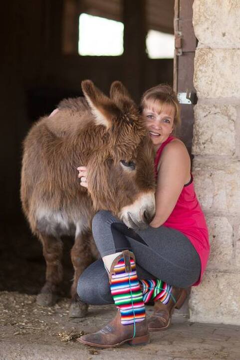 Liz James about photo with donkey